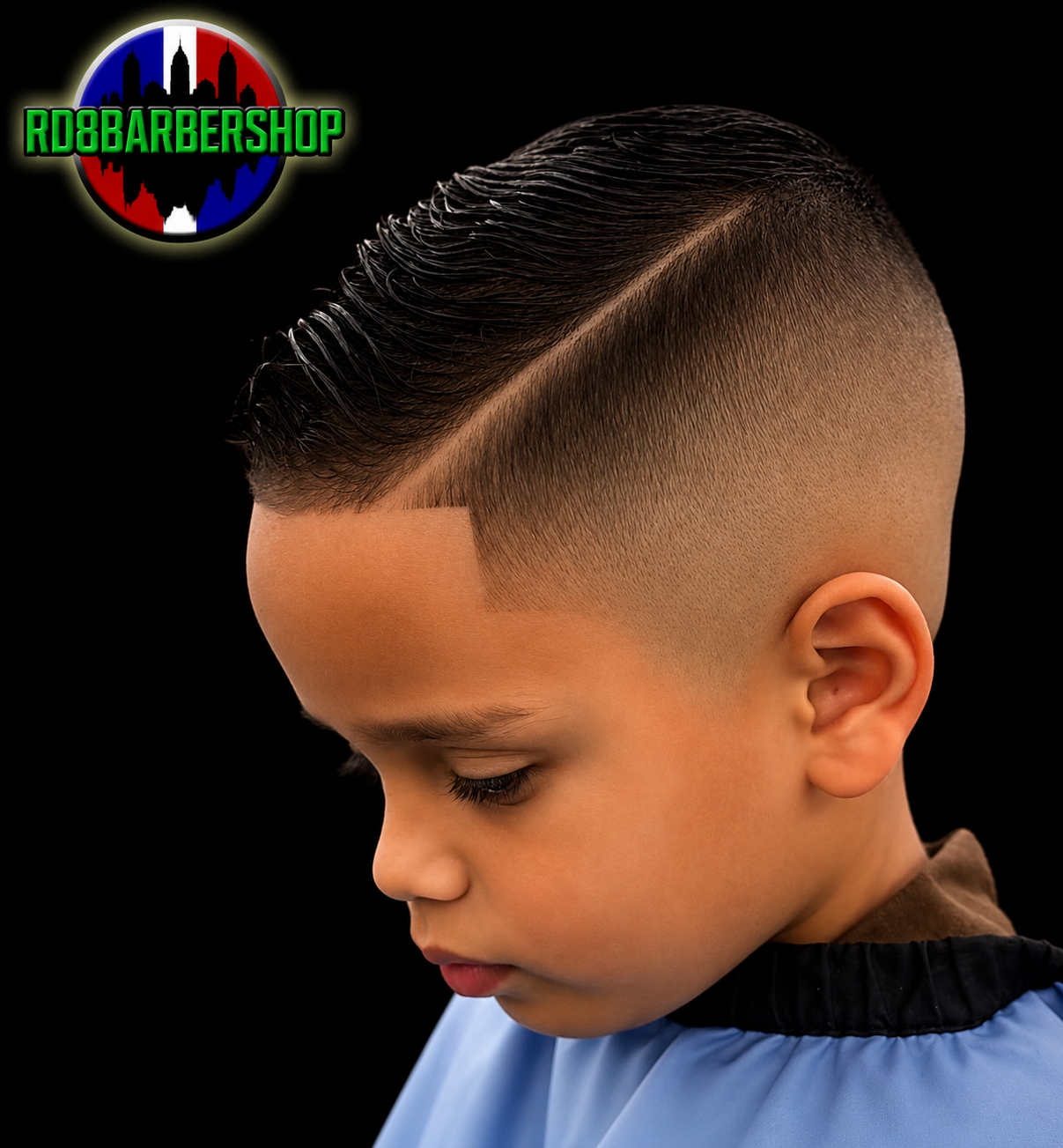 Corte infantil con línea lateral y fade limpio.